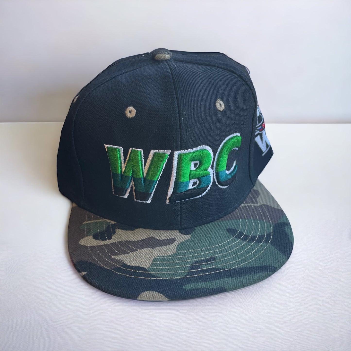 WBC Black SnapBackCap with Camo Peak